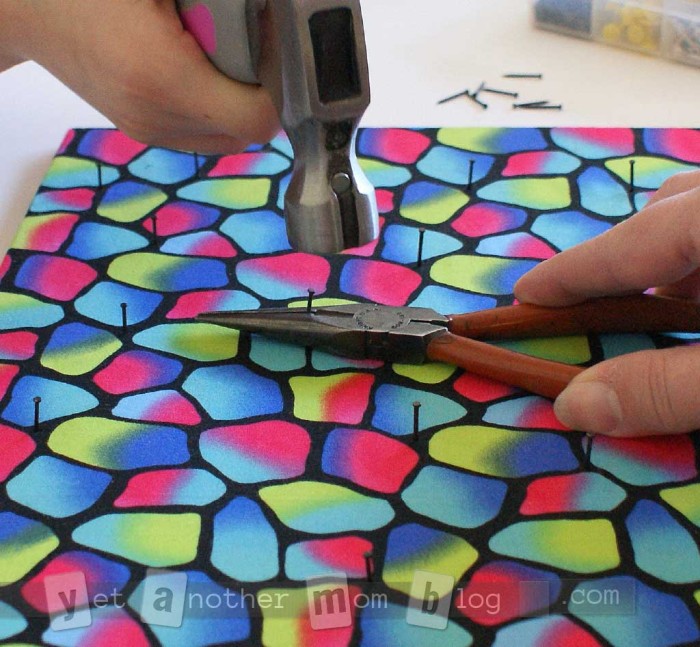 string art - hammering nails held with pliers